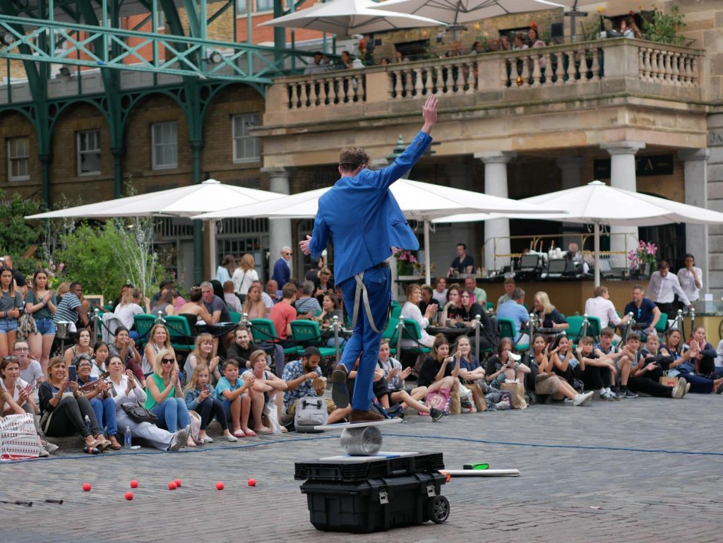 A juggler performing at the Covent Garden Piazza in London.