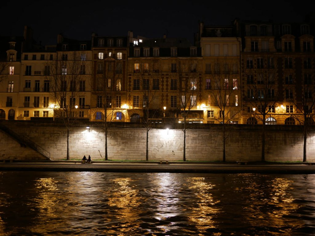 the banks of the Seine in the night