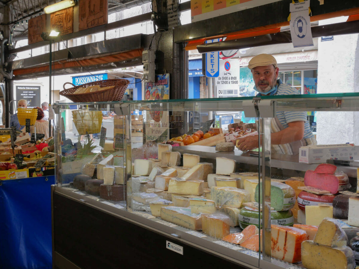 cheese merchant in market