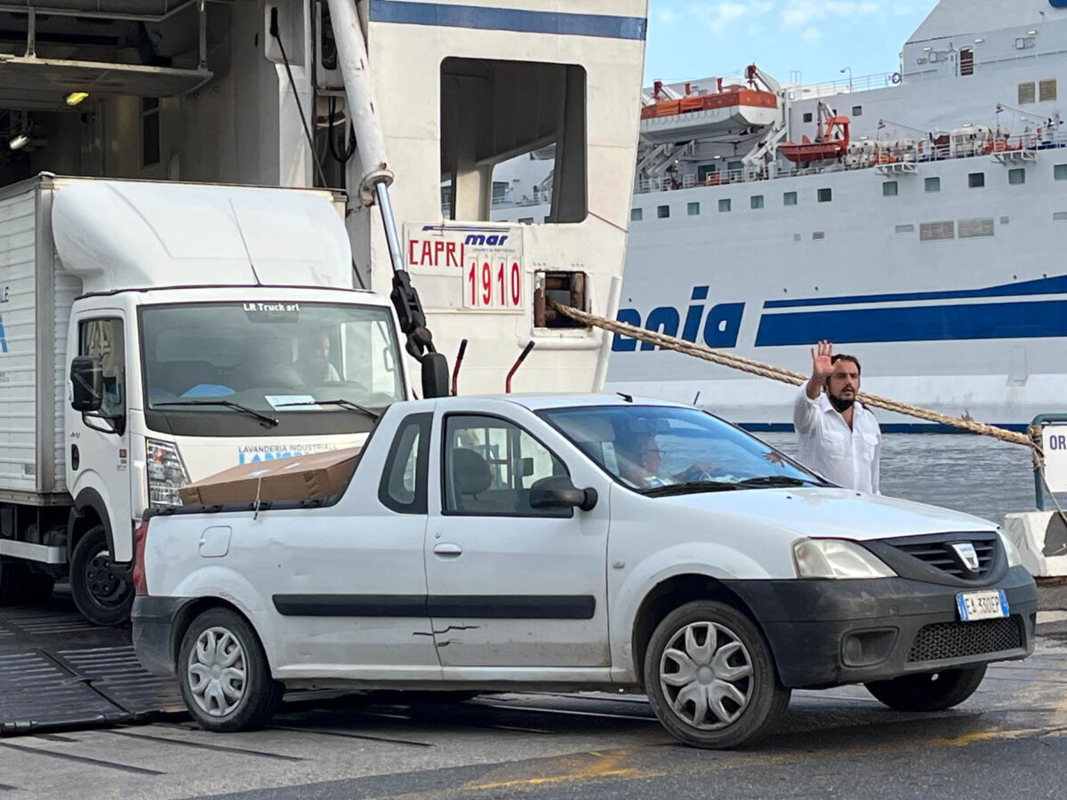 port official shouting at a Naples port