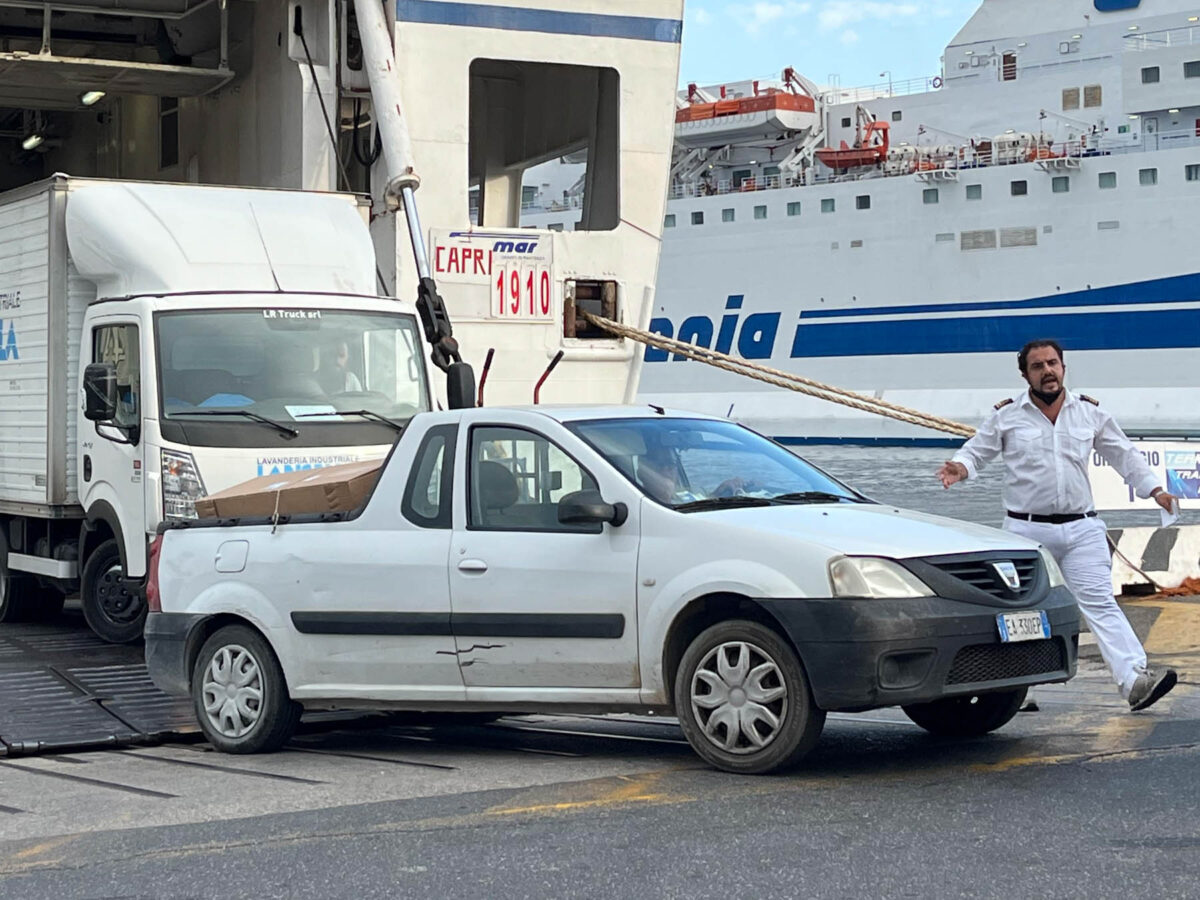 port official shouting at a Naples port